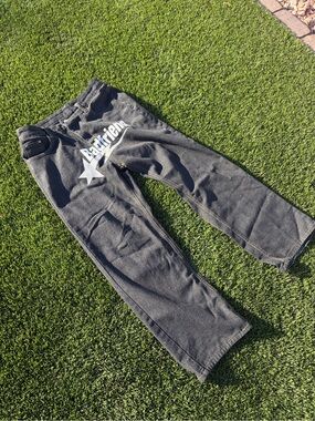 Relaxed Black Men's Jeans with White Star Graphic